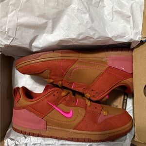 Nike Low-Top Sneakers in Rust Brown with Pink Swoosh